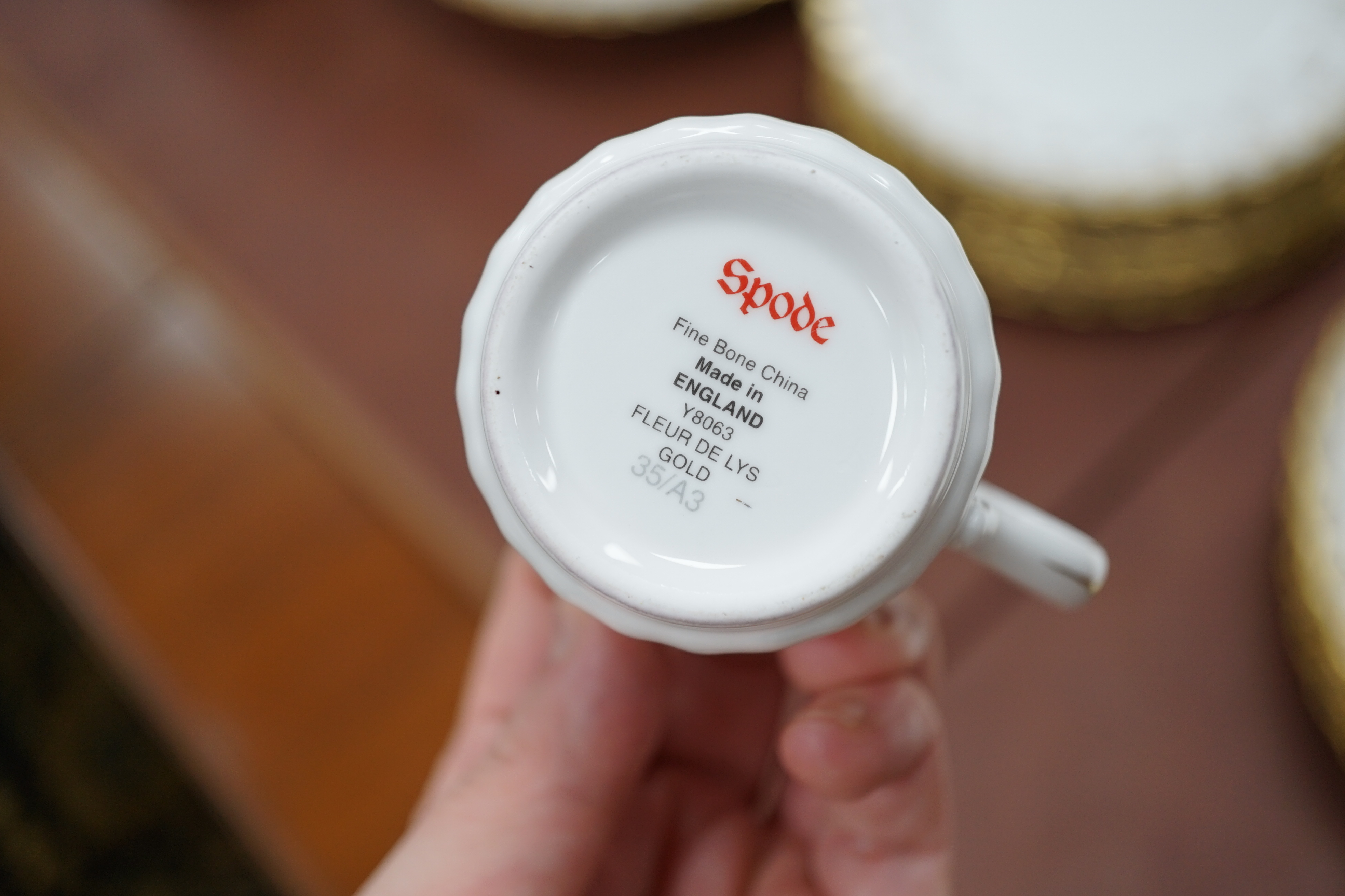 A Spode ‘Fleur de Lys’ dinner, tea and coffee set, settings for eight